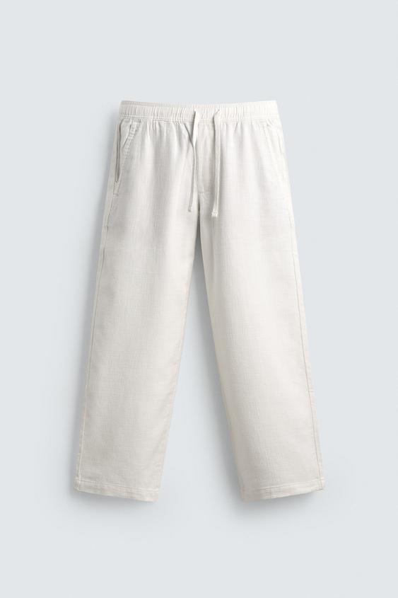 ZARA RELAXED FIT TROUSERS WITH A TEXTURED TEXTURE | OFF WHITE
