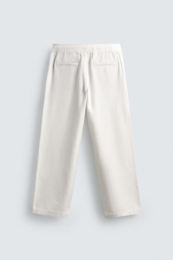 ZARA RELAXED FIT TROUSERS WITH A TEXTURED TEXTURE | OFF WHITE