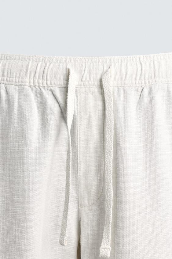 ZARA RELAXED FIT TROUSERS WITH A TEXTURED TEXTURE | OFF WHITE