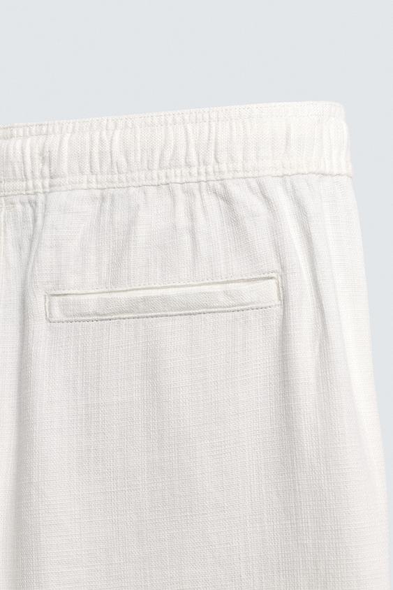 ZARA RELAXED FIT TROUSERS WITH A TEXTURED TEXTURE | OFF WHITE