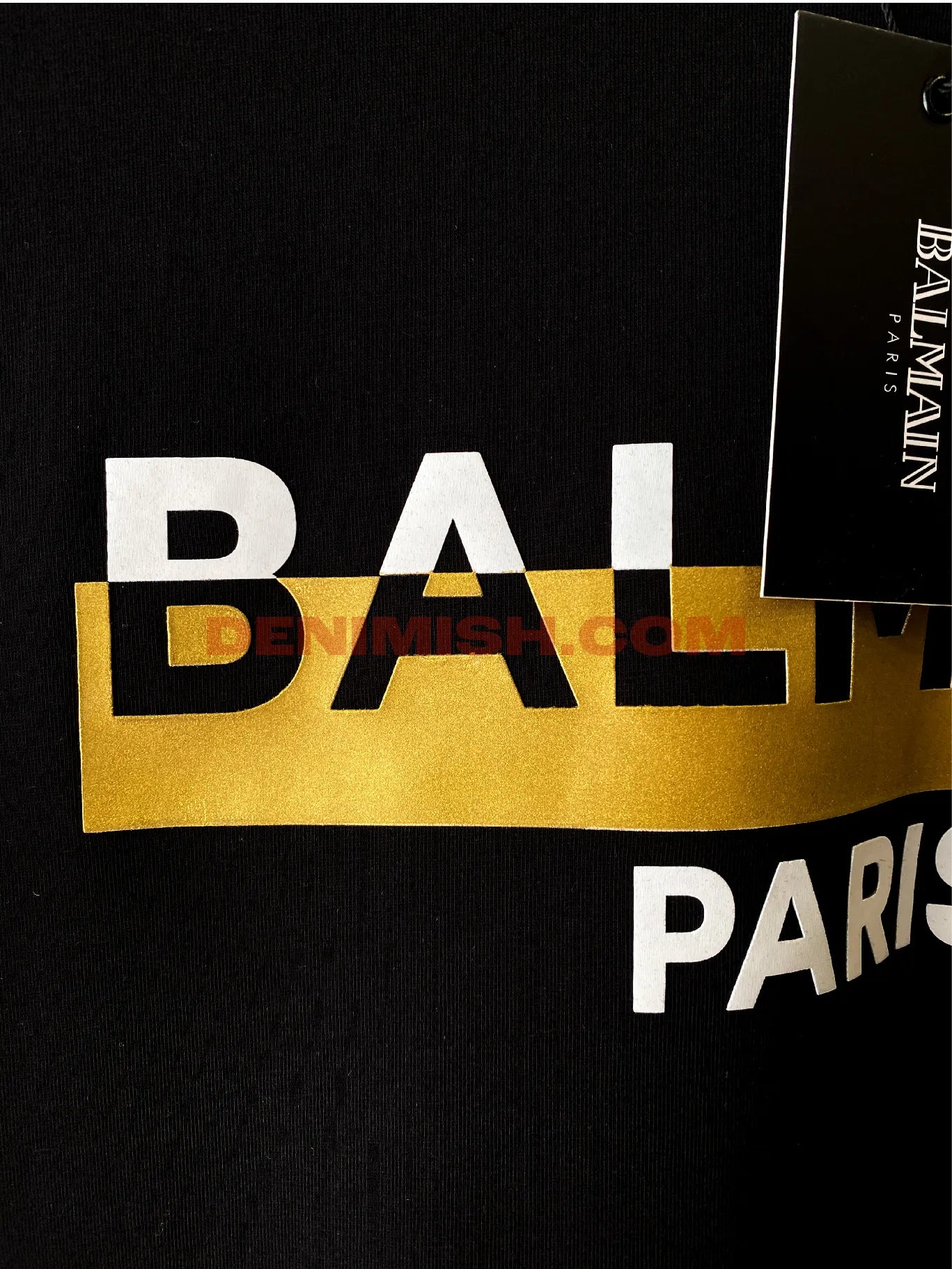 Balmain Paris premium black men's t shirt with a sleek round neck design.