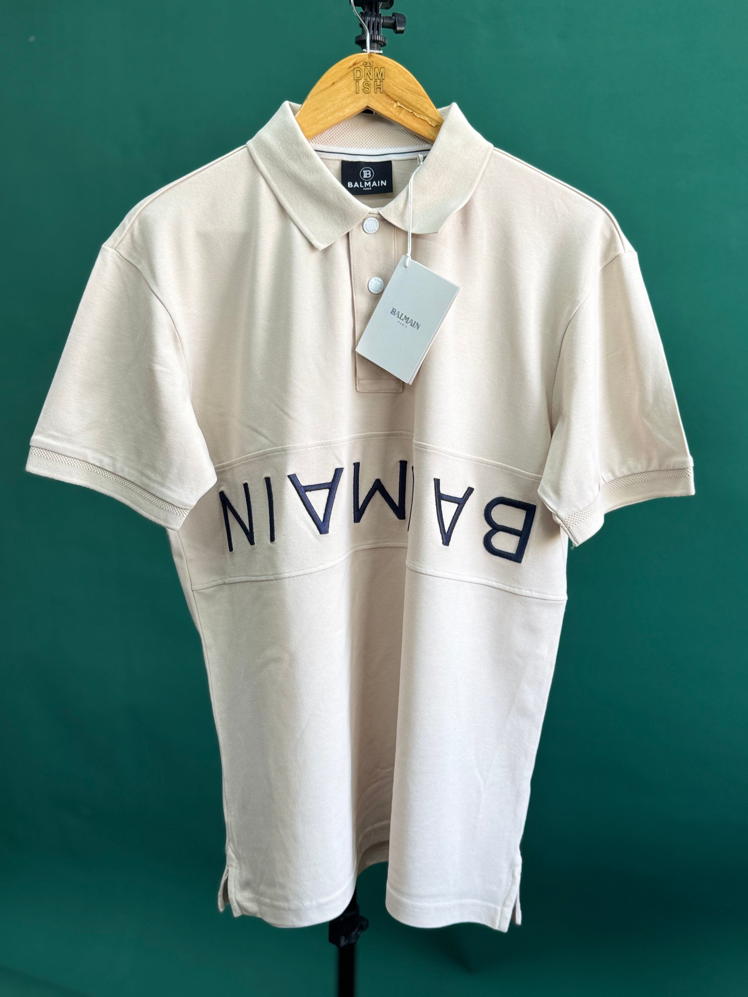 BALMAIN TEXT REVERSE EMBROIDERY POLO SHIRT | CREAM