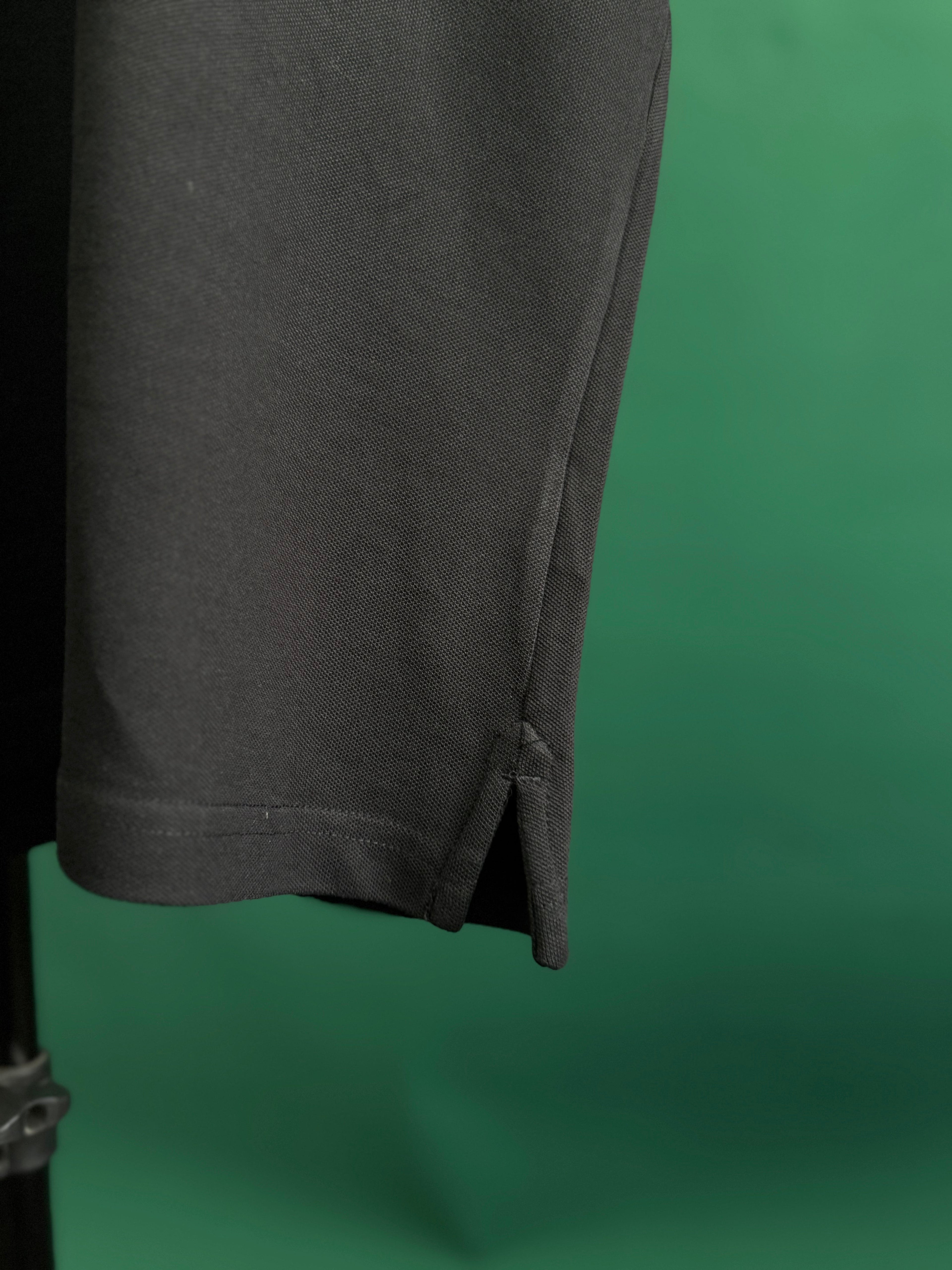 BALMAIN TEXT REVERSE EMBROIDERY POLO SHIRT | BLACK