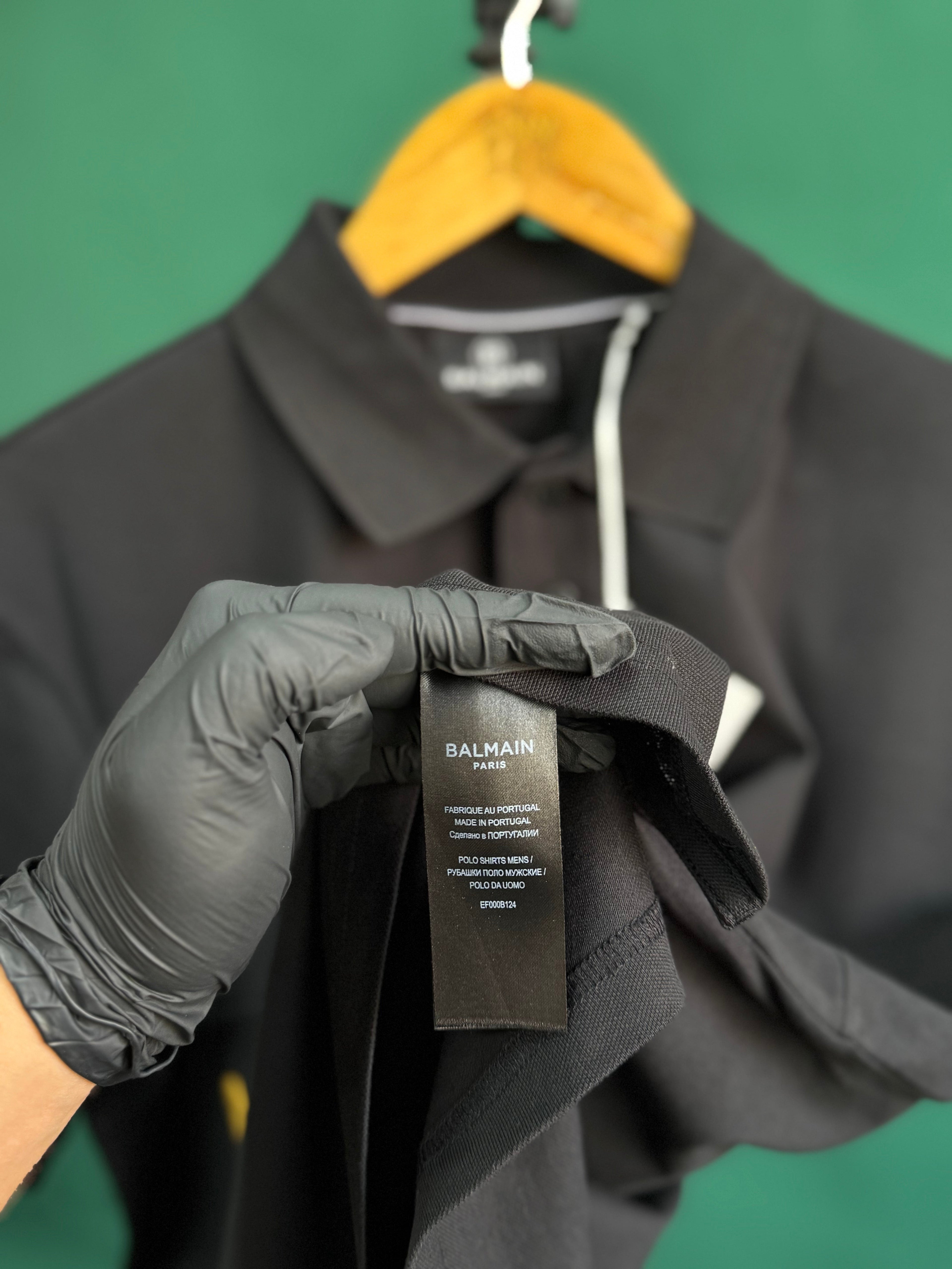 BALMAIN TEXT REVERSE EMBROIDERY POLO SHIRT | BLACK