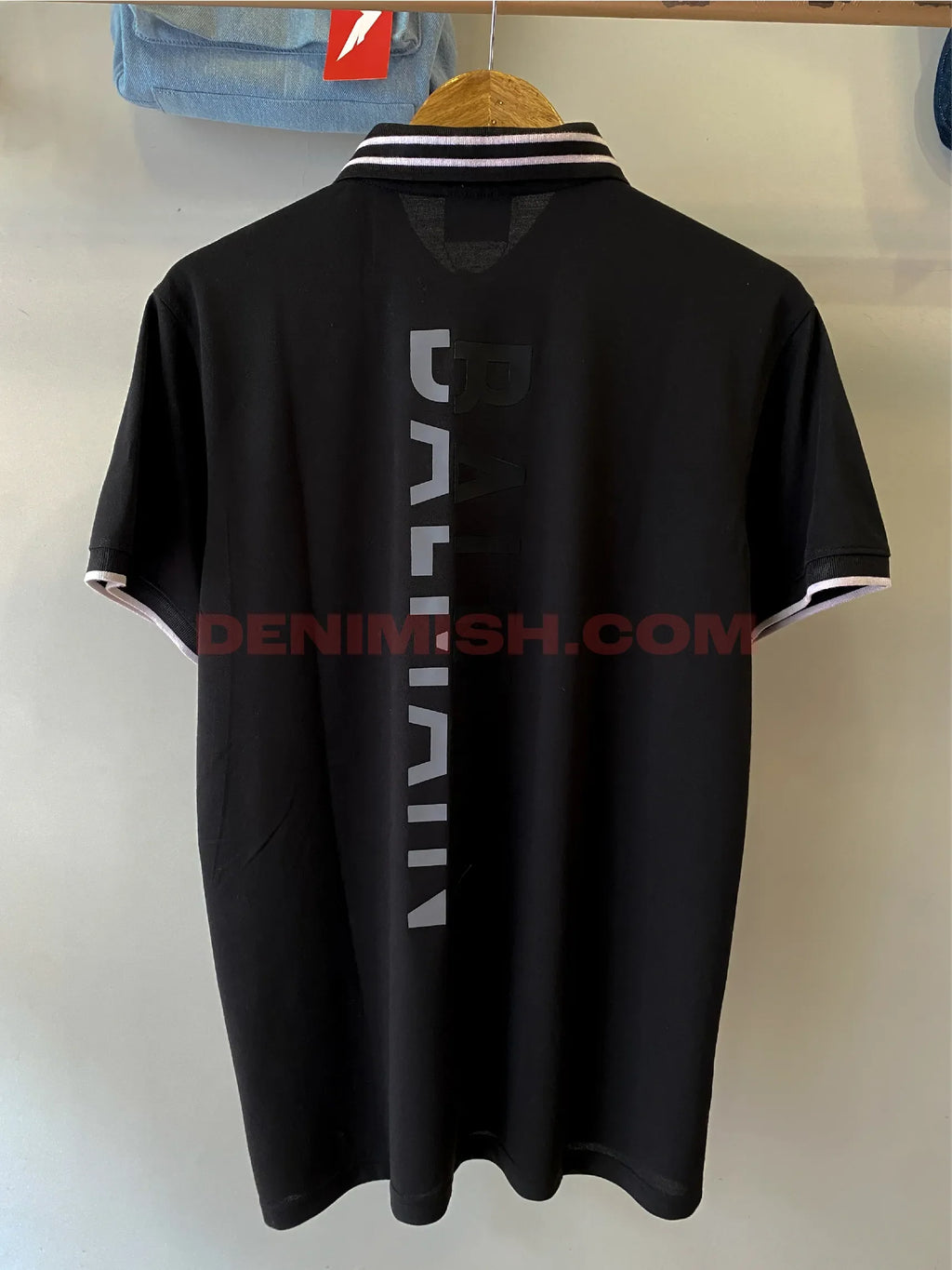 Balmain premium black men's polo shirt with a classic design.