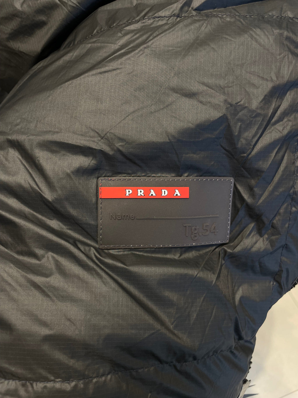 PRADA LUXURY PUFFER JACKET WITH PREMIUM LEATHER DETAILING | NAVY